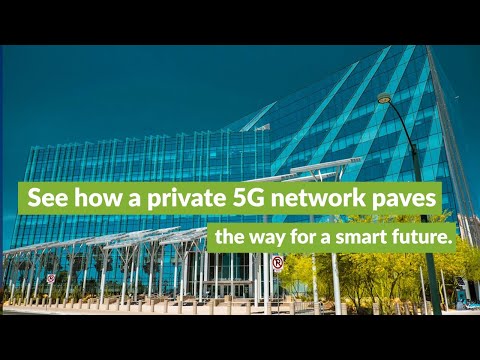 Image a modern office building with glass windows and solar panels above the parking lot with the words “See how a private 5G network paves the way for a smart future” running across the screen.