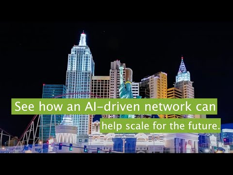Title slide from the video with a skyline view of Las Vegas on a black background. The headline says, “See how an AI-driven network helps scale for the future.”